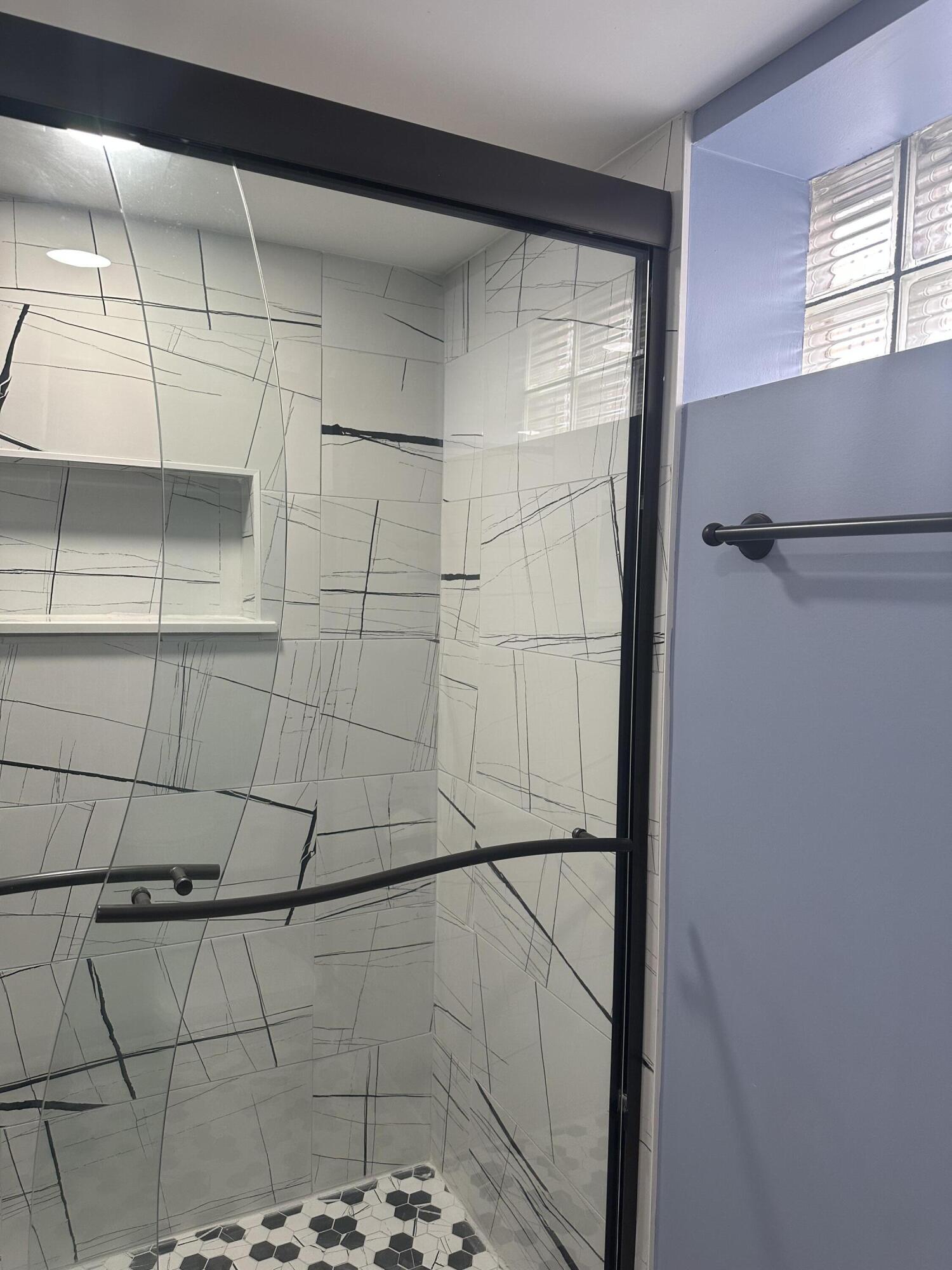 556 Gerry Street Gary, IN 46406 - Photo 15 of 21 a bathroom with a shower