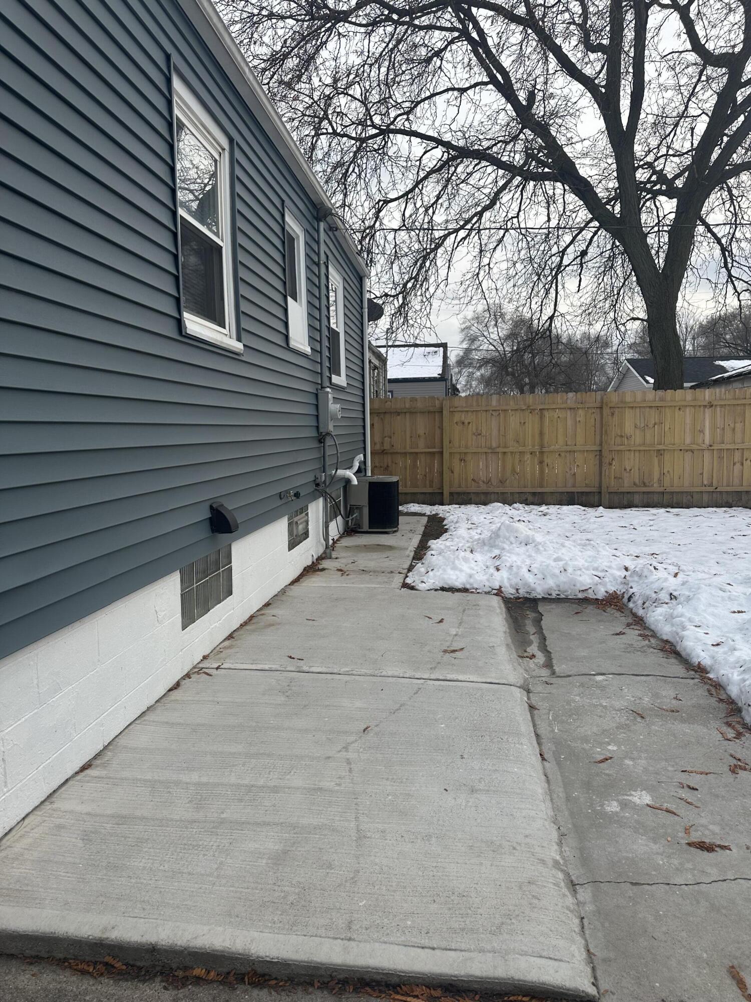 556 Gerry Street Gary, IN 46406 - Photo 20 of 21 a view of a backyard with a tree