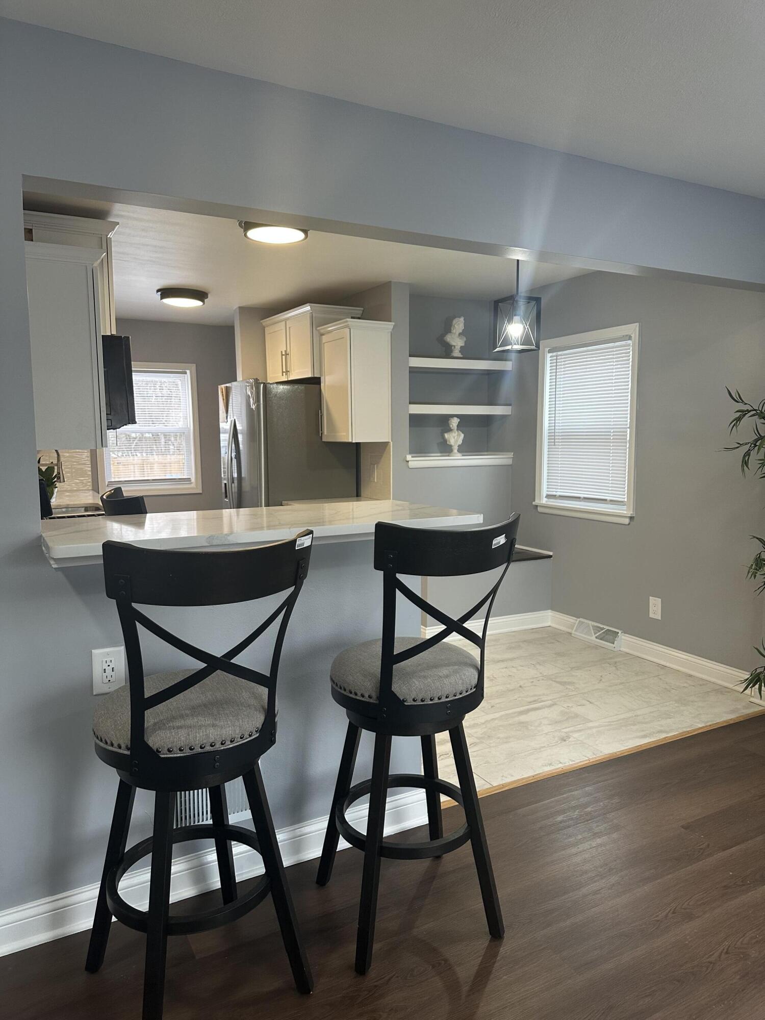 556 Gerry Street Gary, IN 46406 - Photo 6 of 21 a dining room with furniture and window