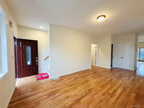 a view of an empty room and window