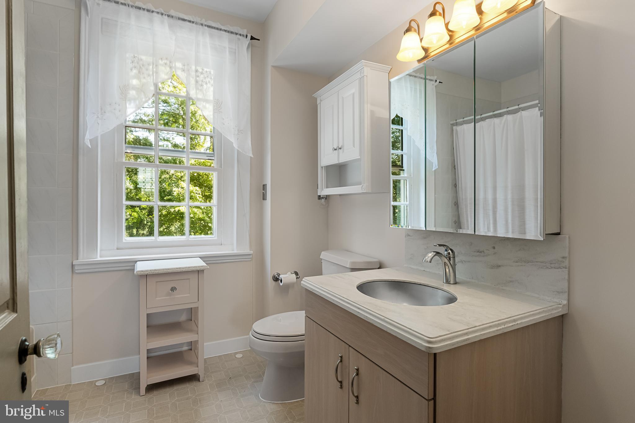 100 Birmingham Road Mount Holly, NJ 08060 - Photo 8 of 11 a bathroom with a sink and a window