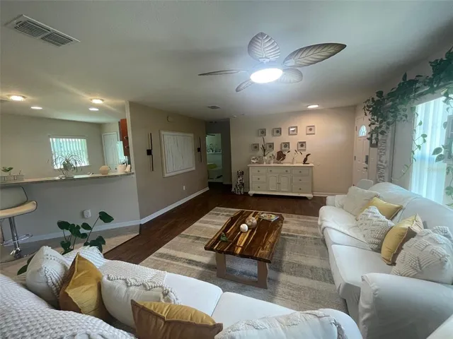 a living room with furniture and a couch