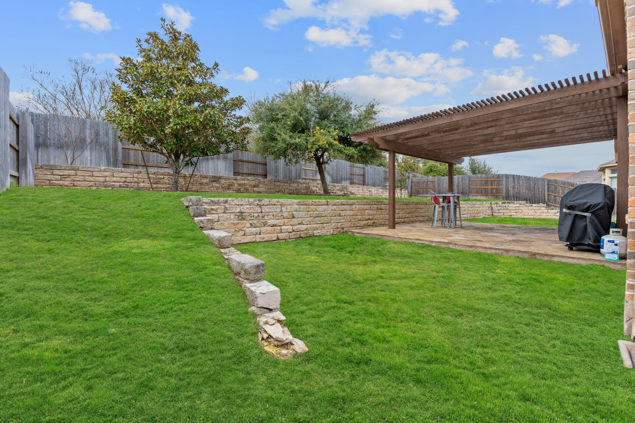 185 Mountain Laurel Way Austin, TX 78737 - Photo 29 of 33 a view of a backyard
