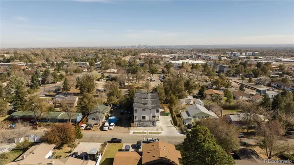 an aerial view of a city with lots of residential buildings