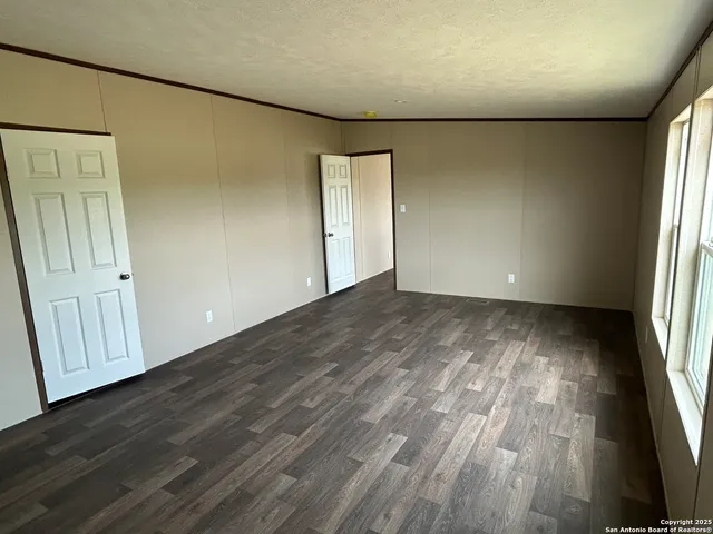 an empty room with windows