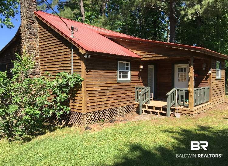 298 A A Bodiford Road Castleberry, AL 36432 - Photo 3 of 29 Cabin Front View