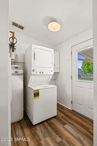 a utility room with washer and dryer