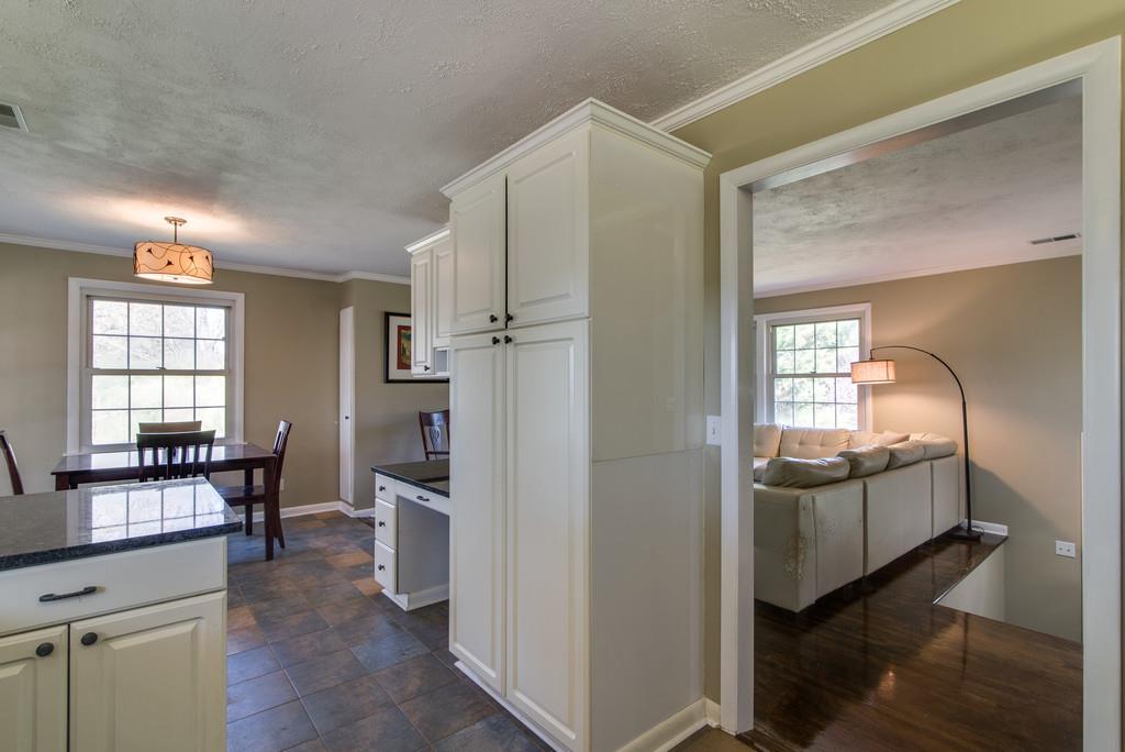 5019 Chaffin Drive Nashville, TN 37221 - Photo 11 of 30 a view of a kitchen and dining room