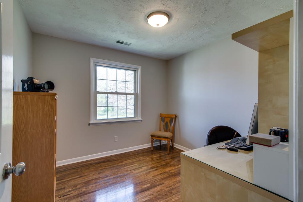 5019 Chaffin Drive Nashville, TN 37221 - Photo 12 of 30 a view of a workspace with furniture and a window