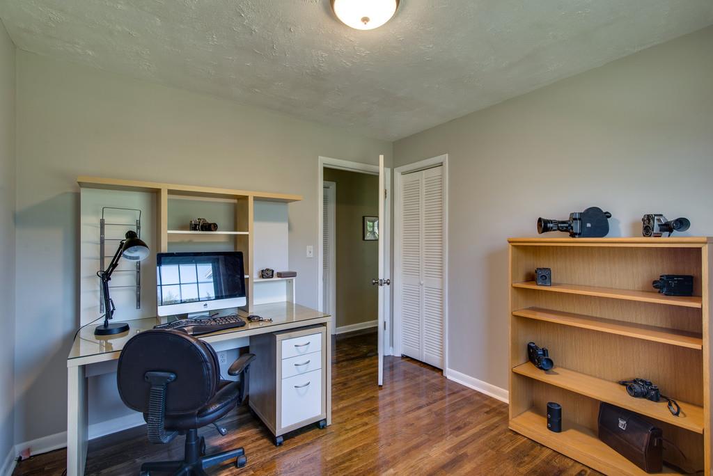 5019 Chaffin Drive Nashville, TN 37221 - Photo 13 of 30 a room with furniture and wooden floor