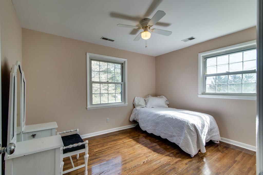 5019 Chaffin Drive Nashville, TN 37221 - Photo 15 of 30 a bedroom with a bed and a window