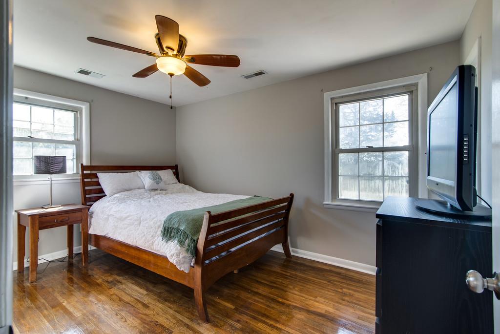 5019 Chaffin Drive Nashville, TN 37221 - Photo 17 of 30 a bedroom with a bed and a window