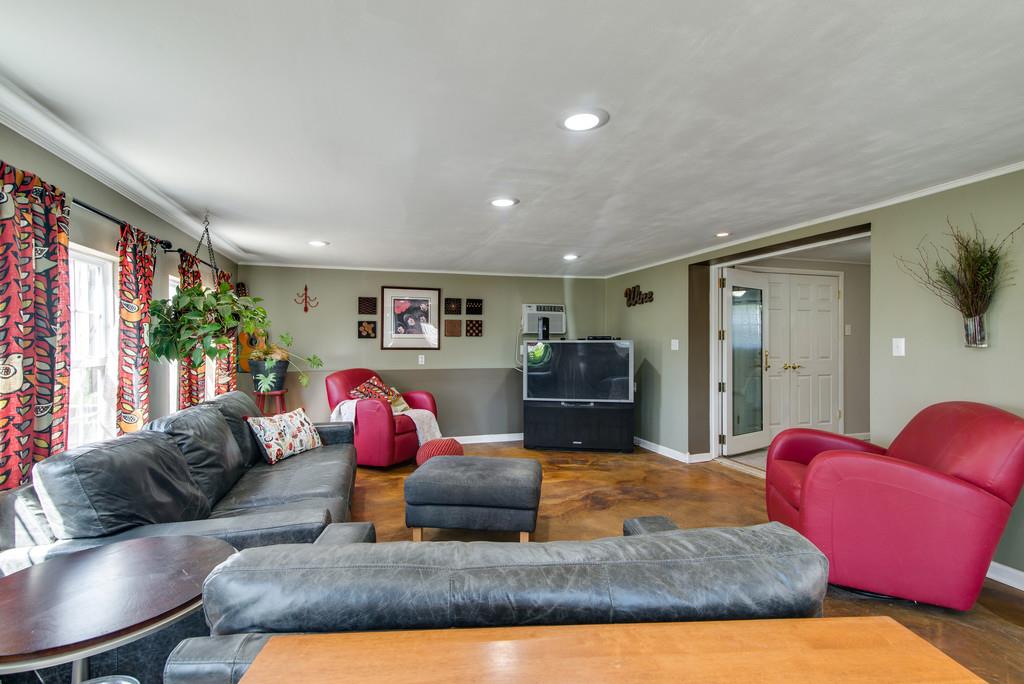5019 Chaffin Drive Nashville, TN 37221 - Photo 25 of 30 a living room with furniture rug and window