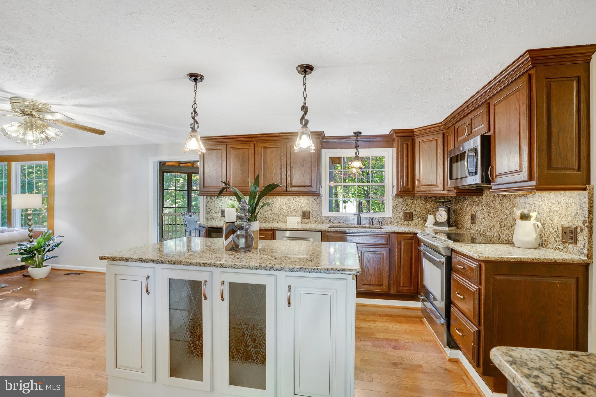 8012 Treasure Tree Court Springfield, VA 22153 - Photo 21 of 69 Quartz Countertops & Pendant Lights