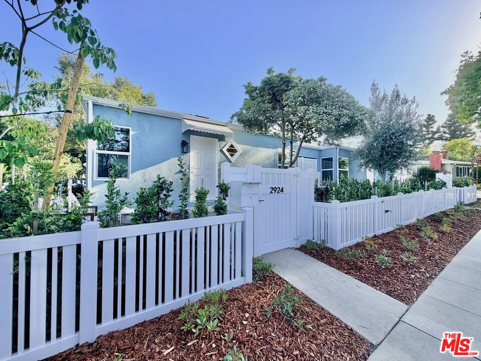 2924 West Riverside Drive Burbank, CA 91505 - Photo 1 of 15 a view of a pathway of a house with wooden fence