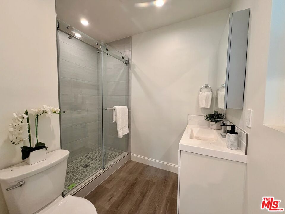 2924 West Riverside Drive Burbank, CA 91505 - Photo 7 of 15 a bathroom with a sink toilet and shower