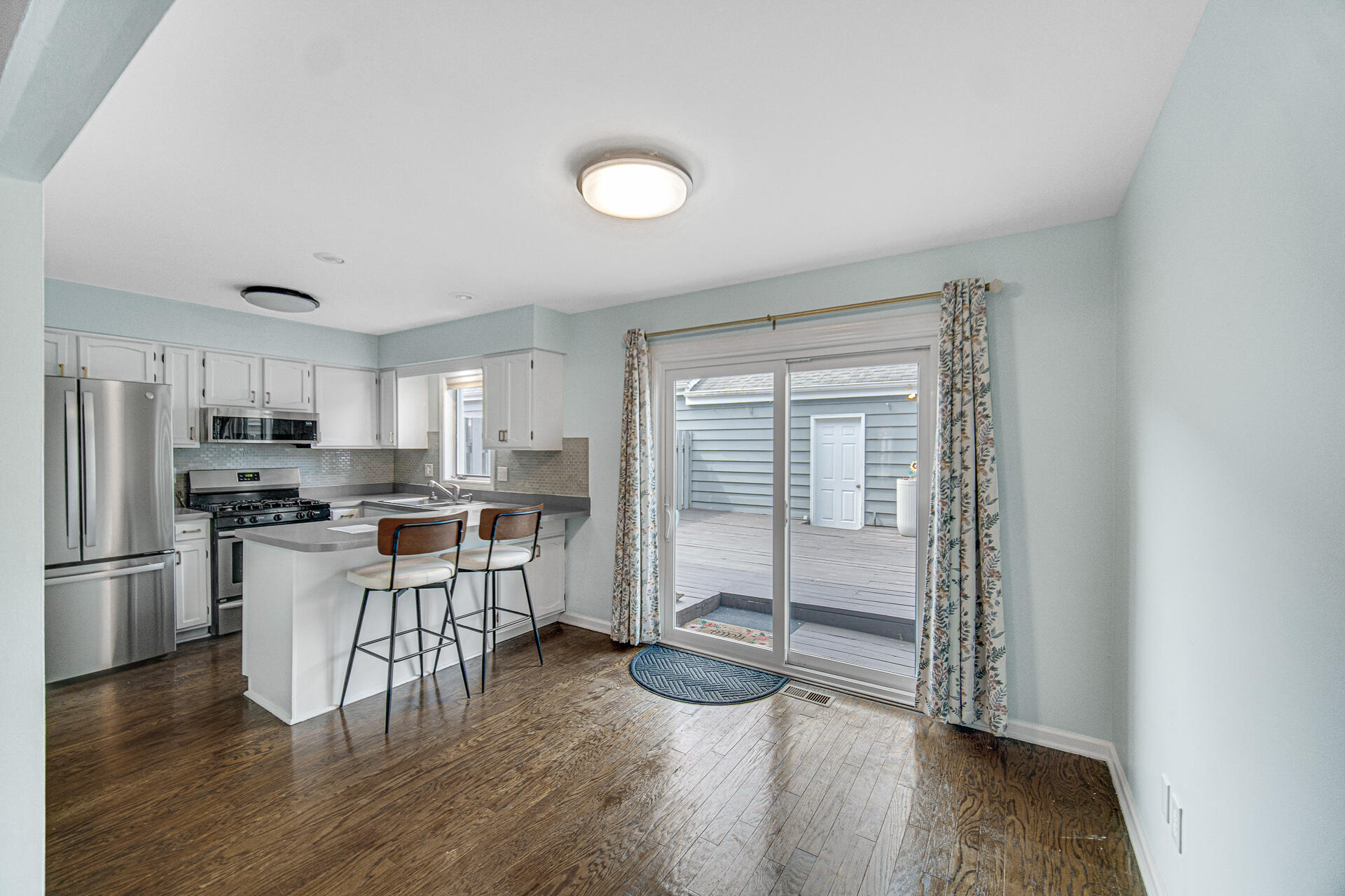 771 Kenmare Parkway Crown Point, IN 46307 - Photo 12 of 19 a kitchen with stainless steel appliances a refrigerator and a stove top oven