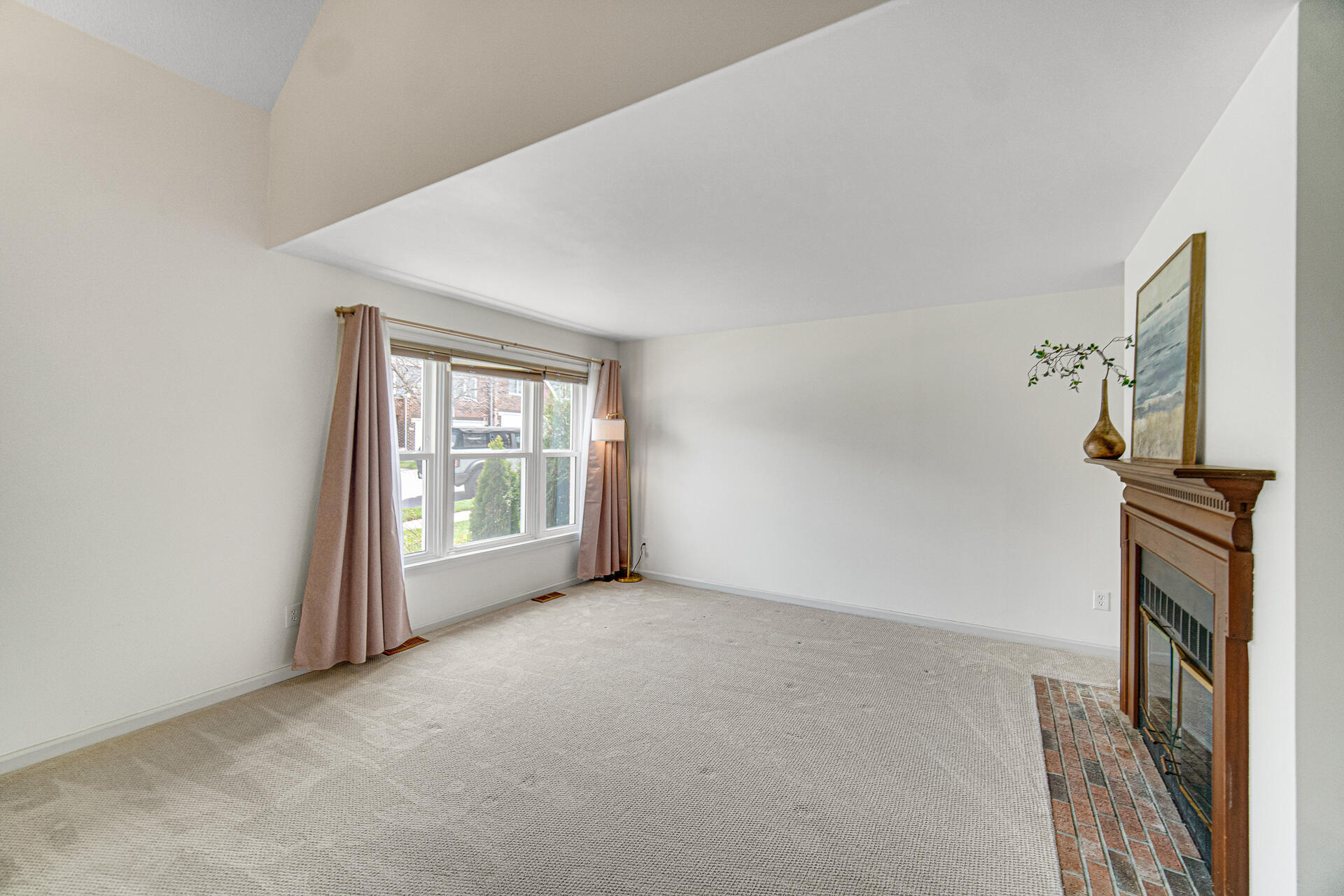 771 Kenmare Parkway Crown Point, IN 46307 - Photo 7 of 19 a view of empty room with a fireplace