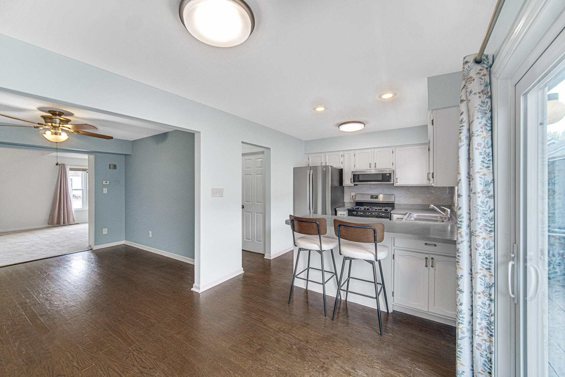 771 Kenmare Parkway Crown Point, IN 46307 - Photo 10 of 19 a kitchen with stainless steel appliances granite countertop a sink and cabinets