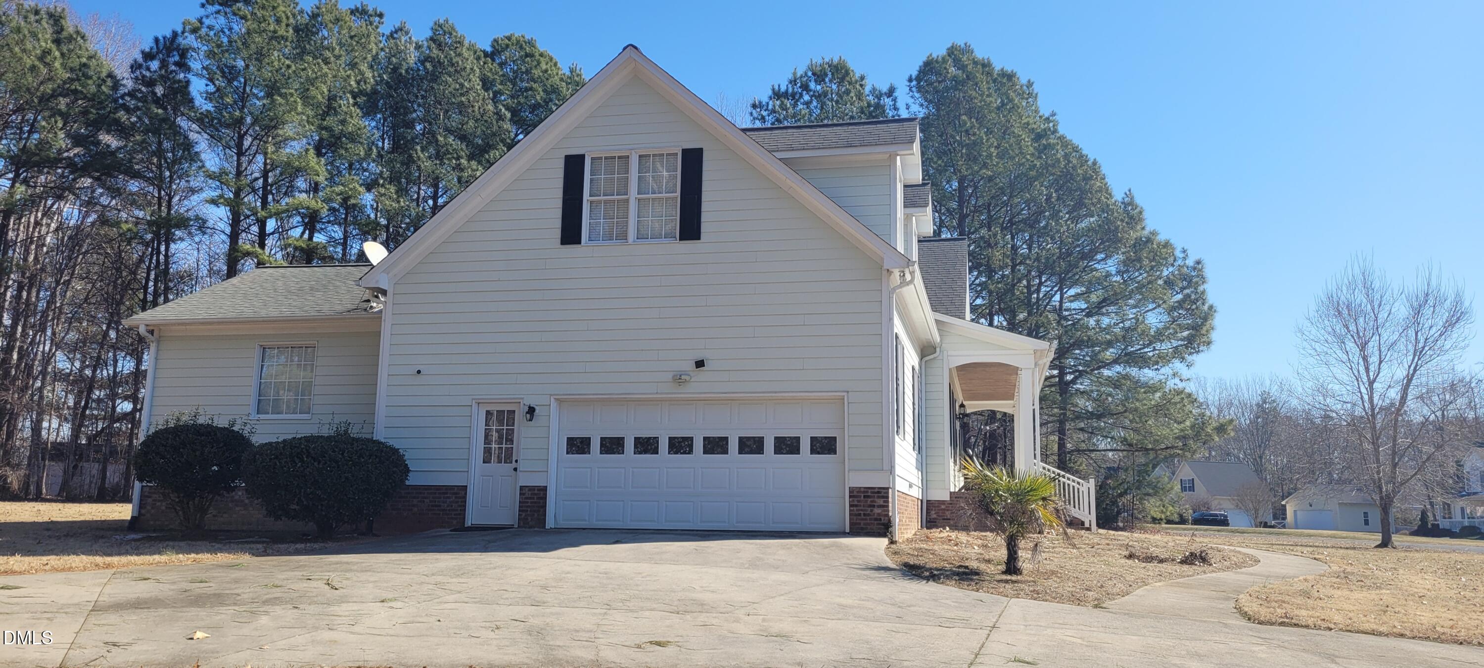 226 Fletcher Ridge Road Timberlake, NC 27583 - Photo 29 of 30 a front view of a house with a yard