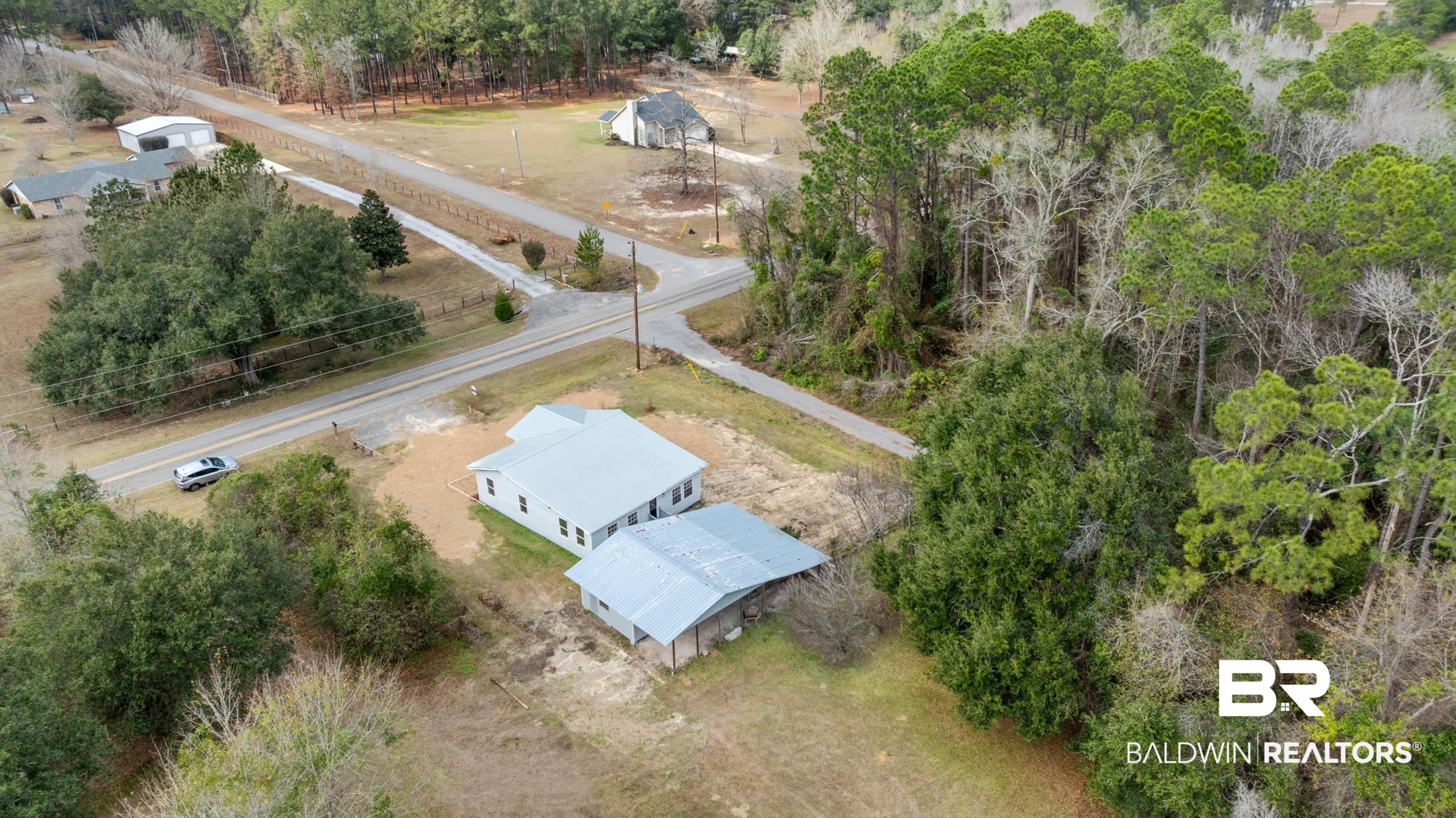 35780 Spring Road North Stapleton, AL 36578 - Photo 31 of 41 Drone / aerial view of a tree filled landscape