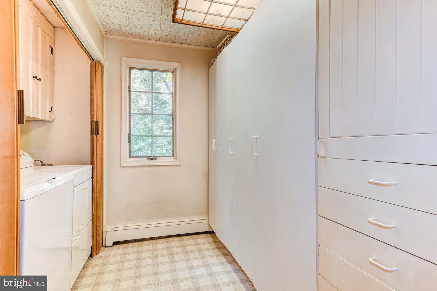 710 West Sandy Ridge Road Doylestown, PA 18901 - Photo 22 of 31 Main Floor laundry with lots of storage.