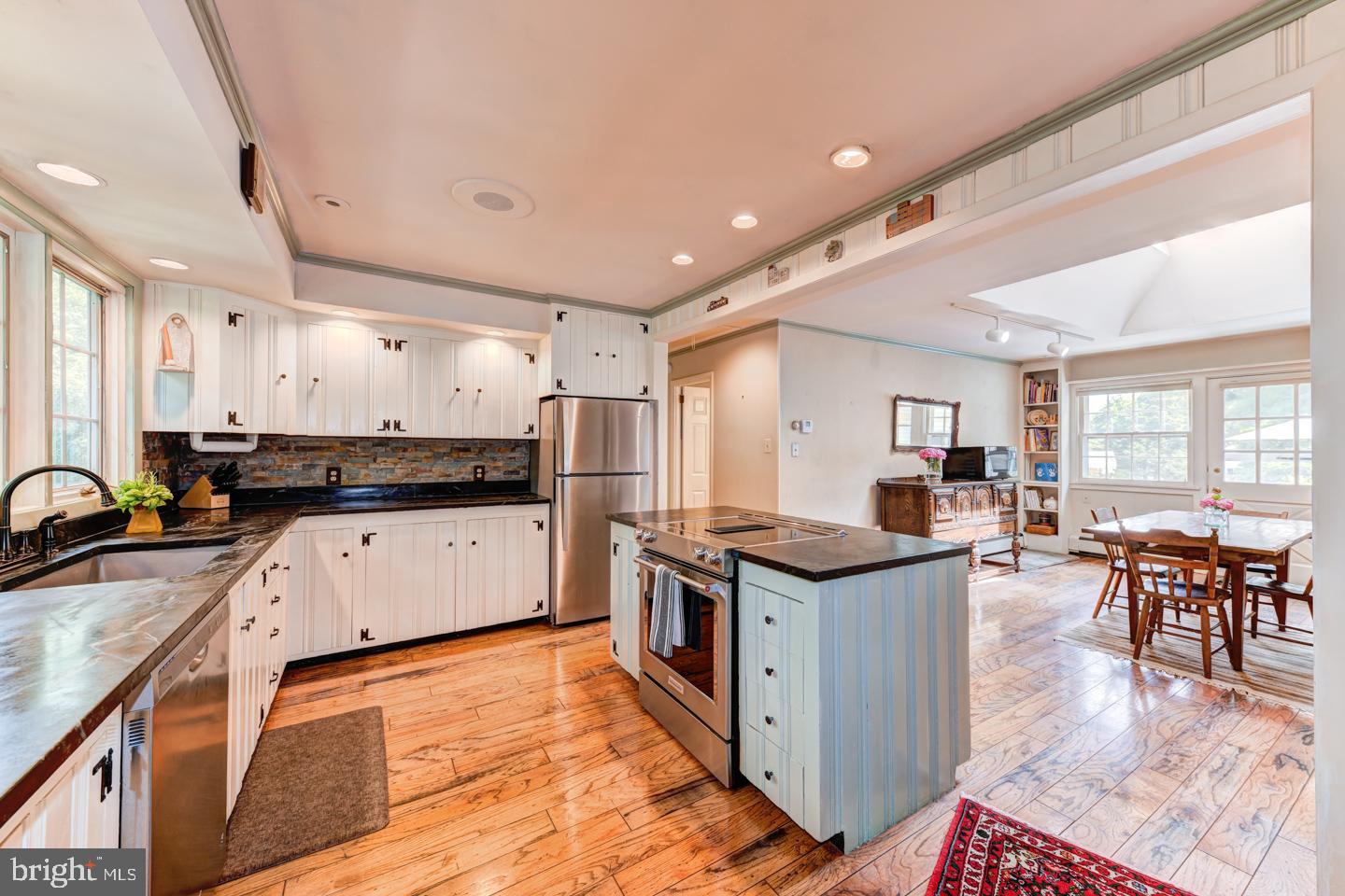 710 West Sandy Ridge Road Doylestown, PA 18901 - Photo 8 of 31 Sunny kitchen with soapstone counter tops