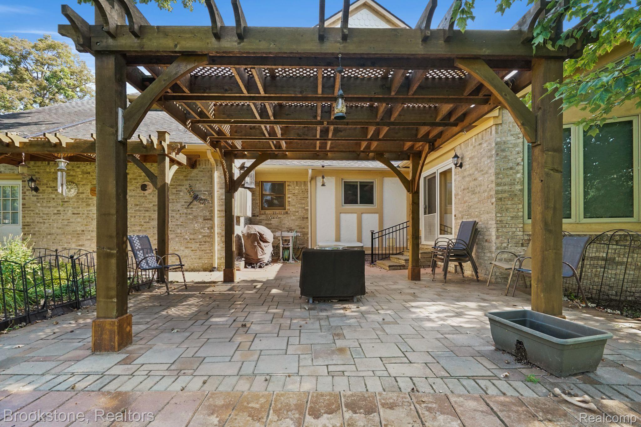 5375 Inverrary Lane Commerce Township, MI 48382 - Photo 29 of 31 Back patio
