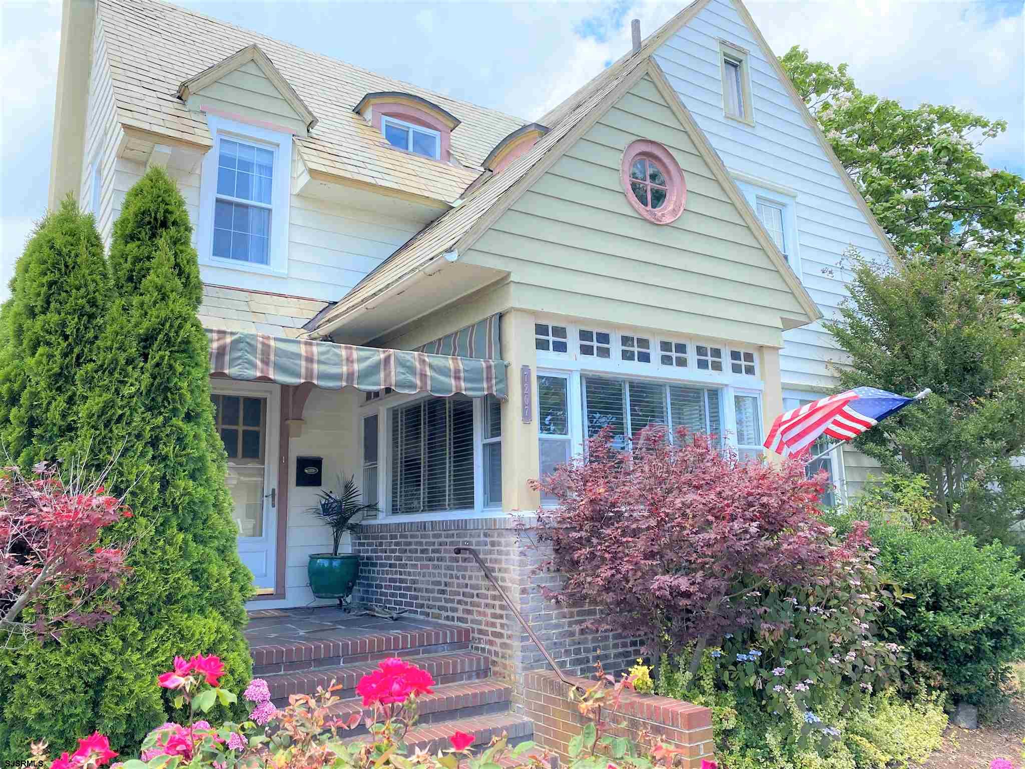 7207 Ventnor Avenue, Unit WINTER RENTAL Ventnor City, NJ 08406 - Photo 1 of 25 a front view of a house with a yard