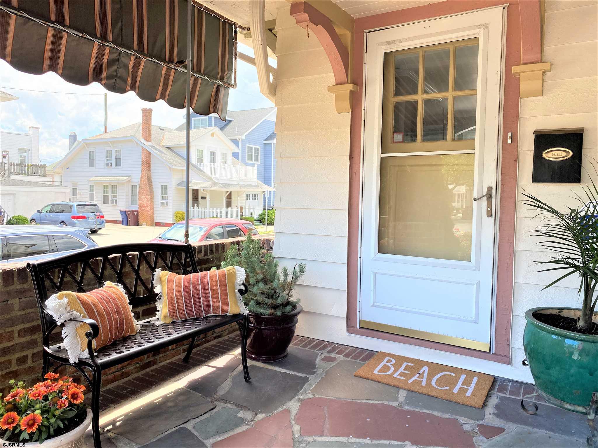 7207 Ventnor Avenue, Unit WINTER RENTAL Ventnor City, NJ 08406 - Photo 2 of 25 a front view of a house with outdoor seating
