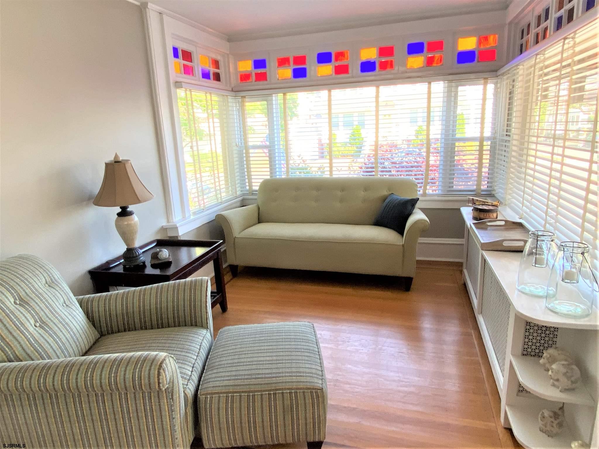 7207 Ventnor Avenue, Unit WINTER RENTAL Ventnor City, NJ 08406 - Photo 9 of 25 a living room with furniture and a large window