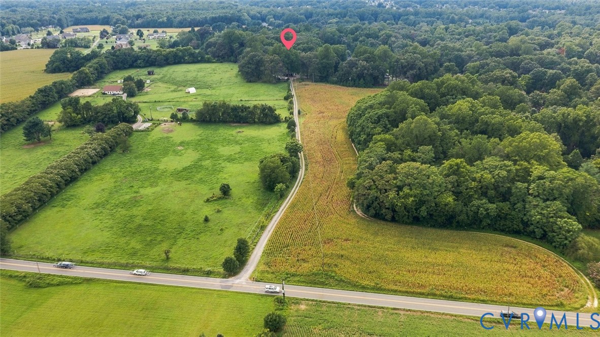6581 Rural Point Road Mechanicsville, VA 23116 - Photo 56 of 58 Expansive green fields, abundant mature trees, and