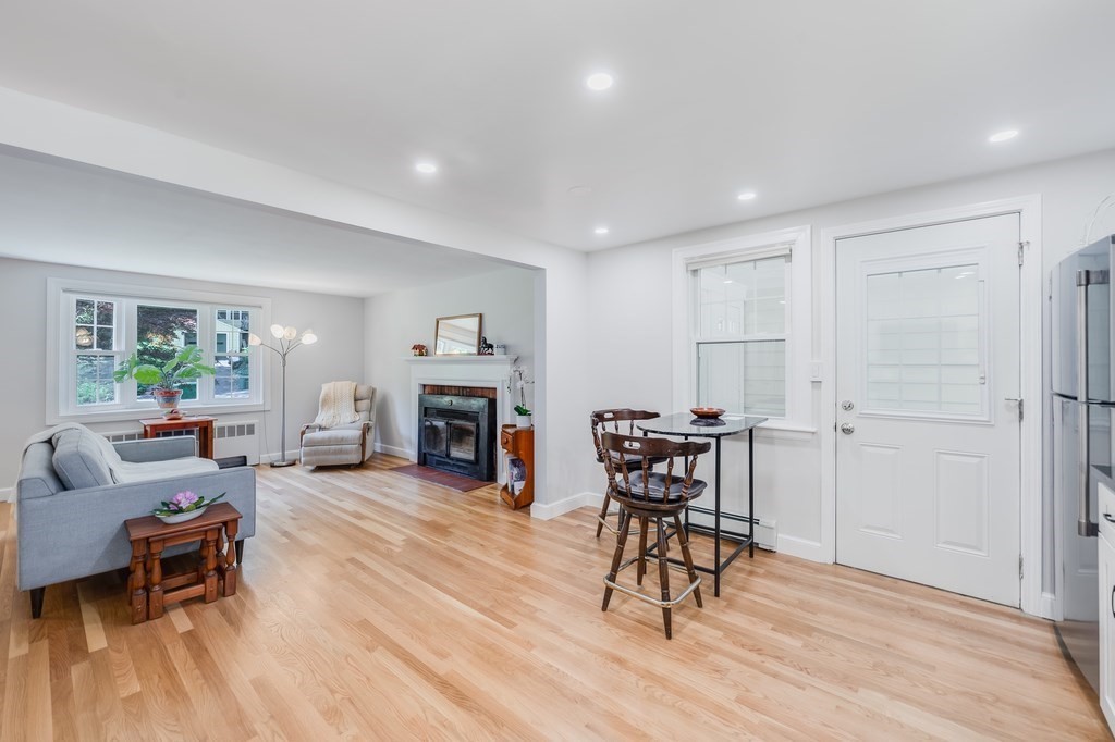 21 Cutler Drive Ashland, MA 01721 - Photo 11 of 28 a living room with furniture and a fireplace