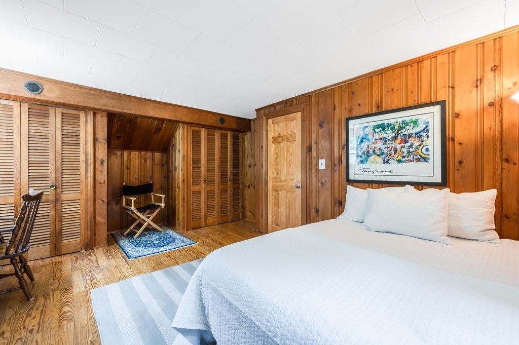 21 Cutler Drive Ashland, MA 01721 - Photo 18 of 28 a bedroom with a bed and a dresser next to a window