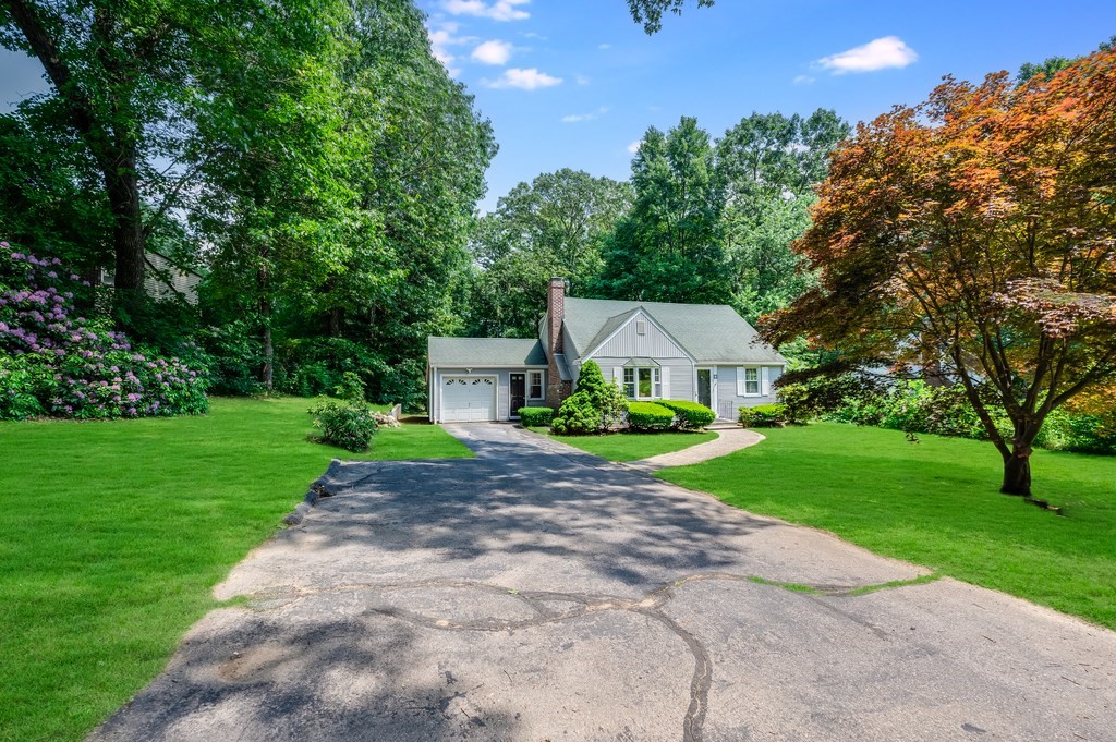 21 Cutler Drive Ashland, MA 01721 - Photo 28 of 28 a front view of a house with garden