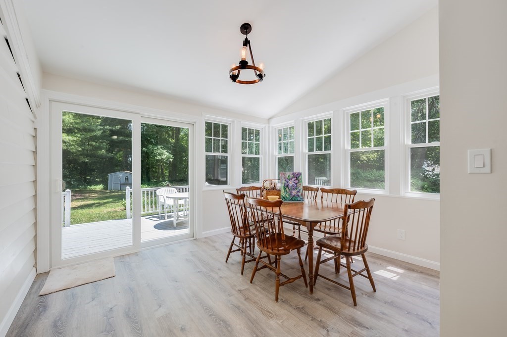 21 Cutler Drive Ashland, MA 01721 - Photo 6 of 28 a view of a dining room with furniture window and wooden floor