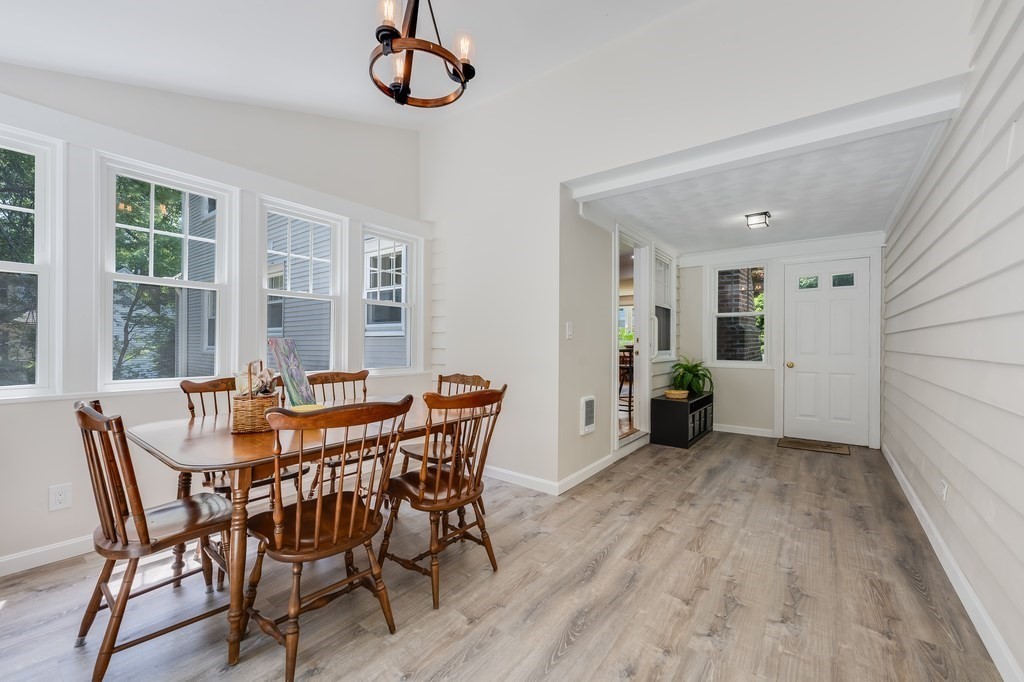 21 Cutler Drive Ashland, MA 01721 - Photo 7 of 28 a view of a dining room with furniture and window