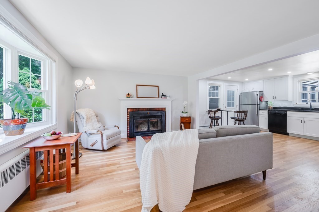 21 Cutler Drive Ashland, MA 01721 - Photo 8 of 28 a living room with furniture and a fireplace