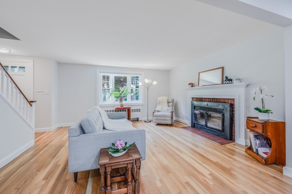 21 Cutler Drive Ashland, MA 01721 - Photo 10 of 28 a living room with furniture and a fireplace