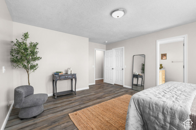 1045 West 3600th South Perry, UT 84302 - Photo 21 of 57 Wood-finish flooring, light-toned walls, and a flush mount ceiling light