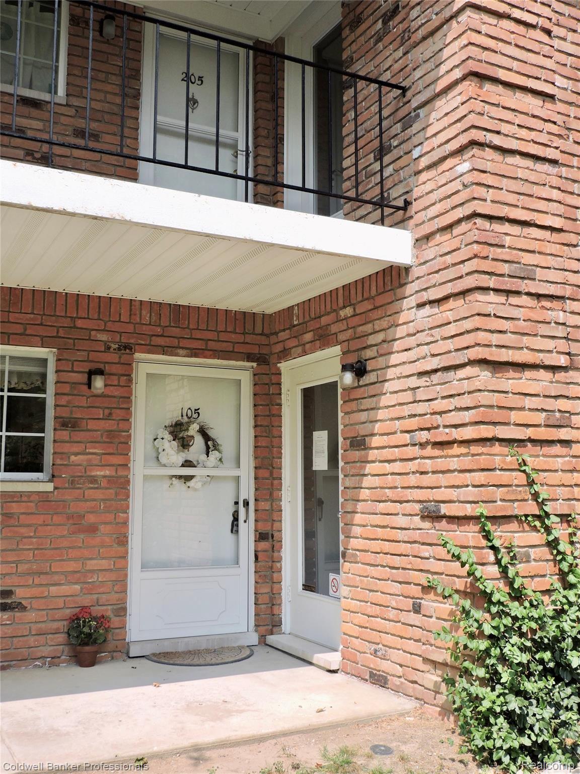 419 Prospect Street, Unit 105 Romeo, MI 48065 - Photo 24 of 37 Private first-floor front entrance.