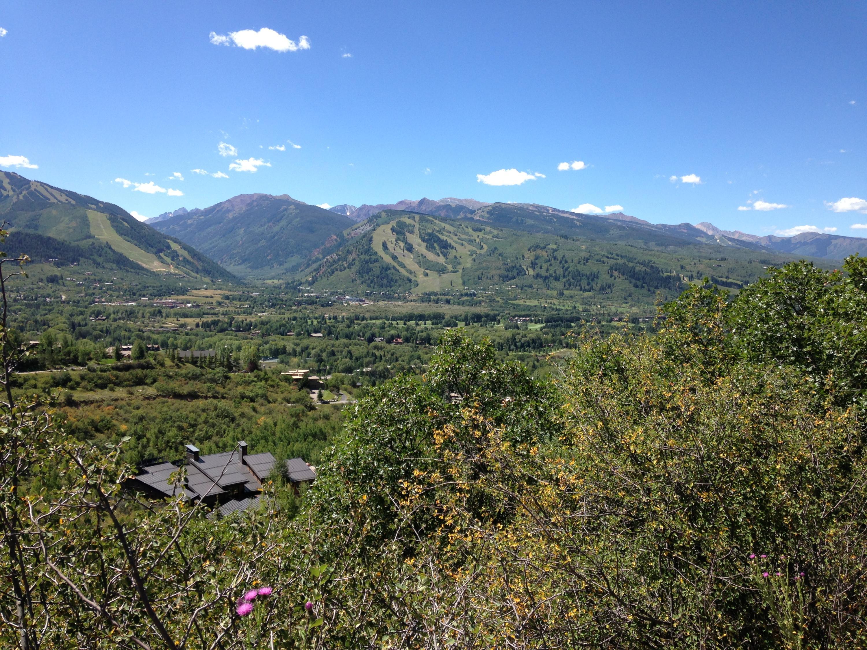 221 Wright Road Aspen, CO 81612 - Photo 11 of 16 a view of a city with mountains in the background