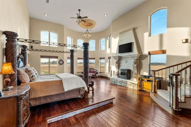 a bed room with furniture and a fireplace