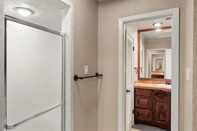 a view of a bathroom from the hallway
