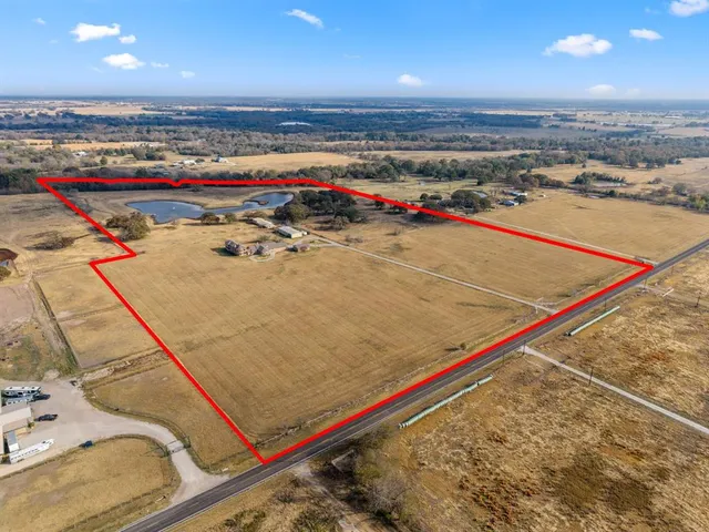 a view of an outdoor space and tennis court