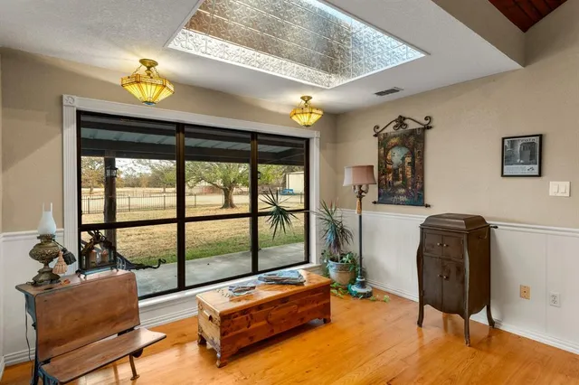 a kitchen with kitchen island granite countertop a sink and stove