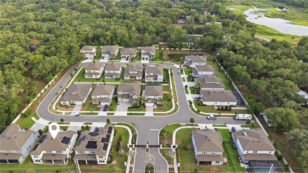 13816 Sharp Hawk Drive Riverview, FL 33569 - Photo 72 of 76 an aerial view of a multi story residential apartment building with outdoor space