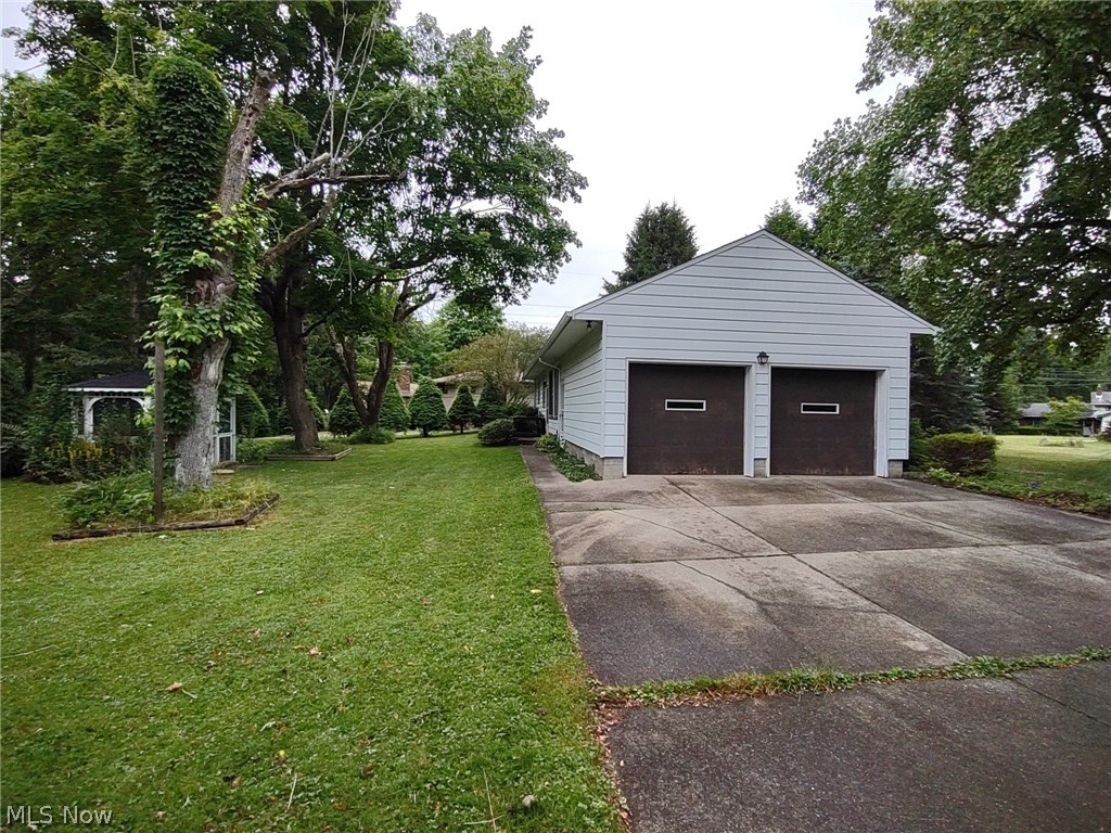 595 Barrett Road Berea, OH 44017 - Photo 13 of 18 Garage with a lawn