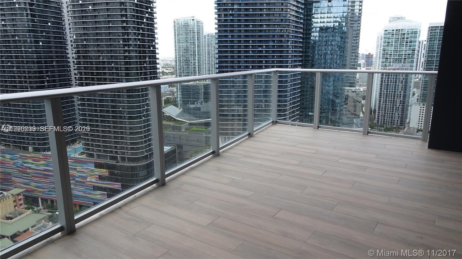 1010 Brickell Avenue, Unit 3211 Miami, FL 33131 - Photo 11 of 11 a view of balcony with a floor to ceiling window
