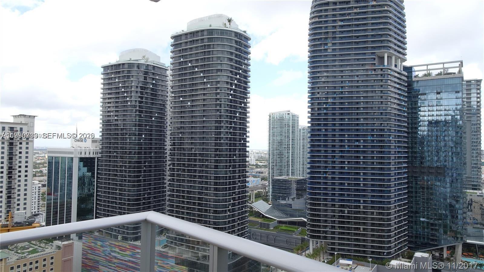 1010 Brickell Avenue, Unit 3211 Miami, FL 33131 - Photo 10 of 11 a view of a building with a street